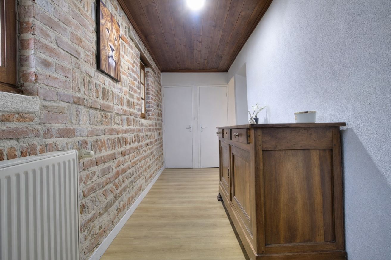 Couloir en brique – Gîte Les Pétillières